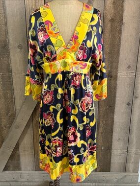 Trina Turk dress in a vibrant navy and yellow mixed floral paisley Print Resort